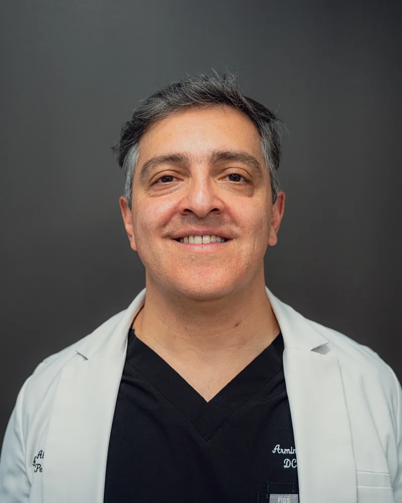 Armin Abron, DDS, MS, Founder · Periodontist · Implant Surgeon