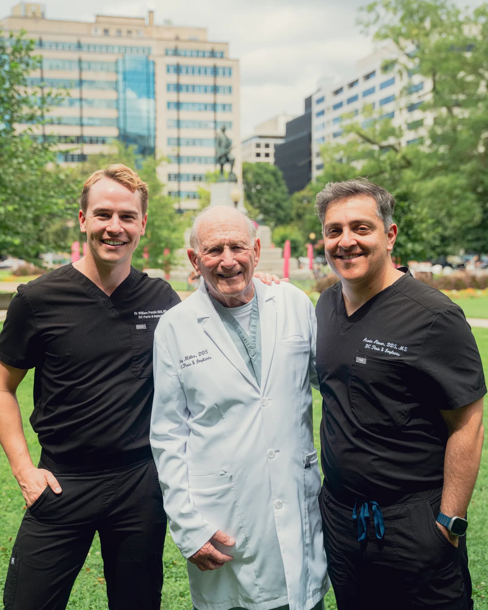 Drs. William Porzio, Garry Miller, and Armin Abron of DC Perio & Implants in Farragut Square, steps from the practice